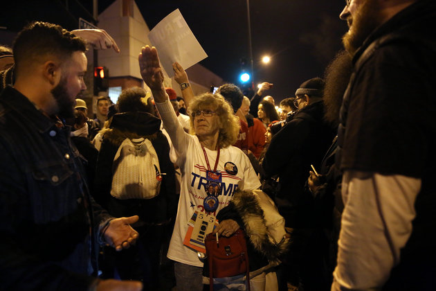 Donald Trump supporter Birgitt Peterson of Yorkville, Ill., argues with protesters outside the UIC Pavilion after the cancelled rally for the Republican presidential candidate in Chicago on Friday, March 11, 2016. (E. Jason Wambsgans/Chicago Tribune/TNS via Getty Images)