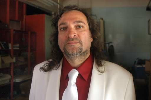 Mr. Sclafani, whose definition of business formal includes "this white suit forever"